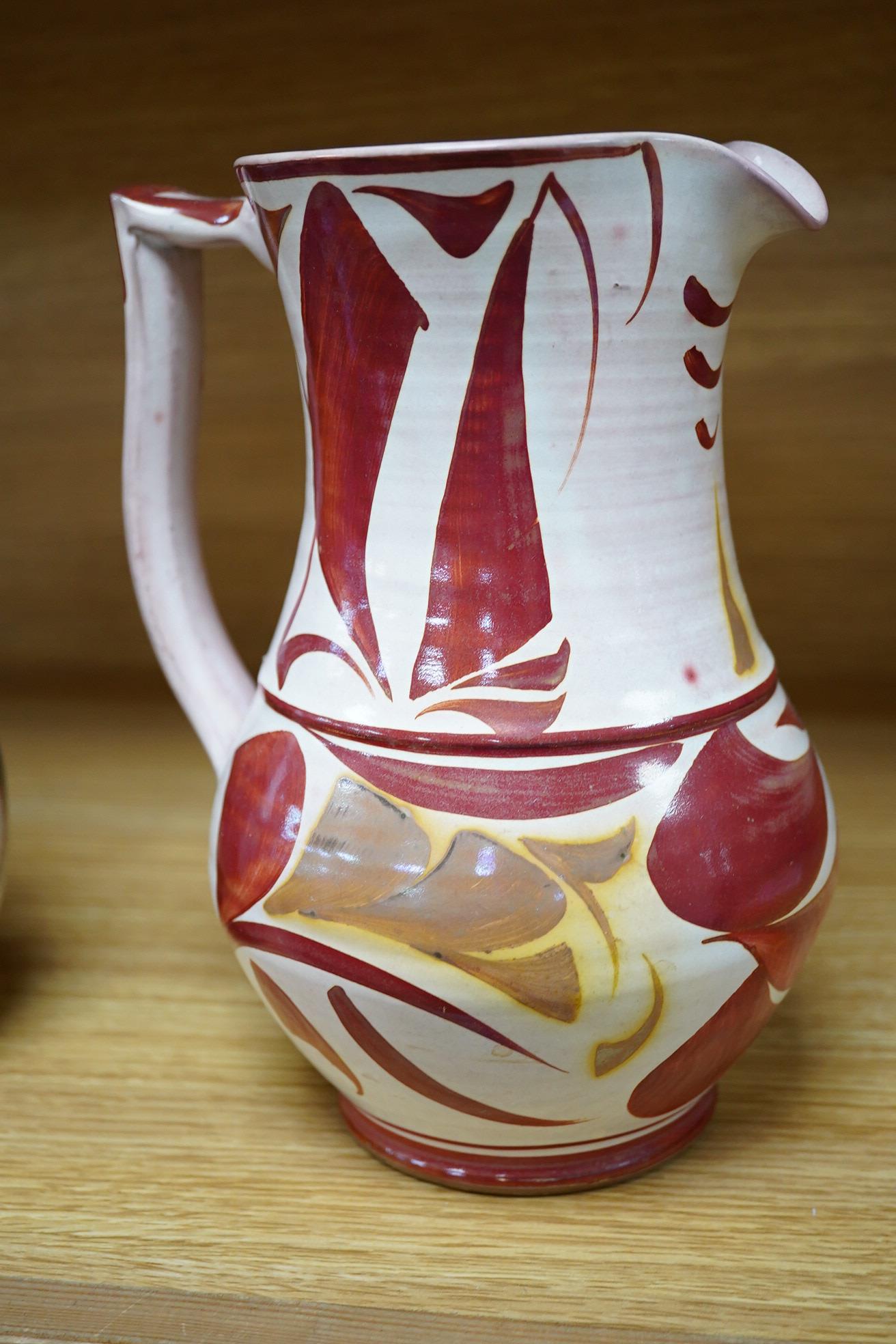 Alan Caiger-Smith (1930-2020), an Aldermaston Pottery lustre glazed jug and another, tallest 22cm. Condition - good